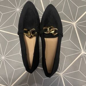 Black flats with gold accent